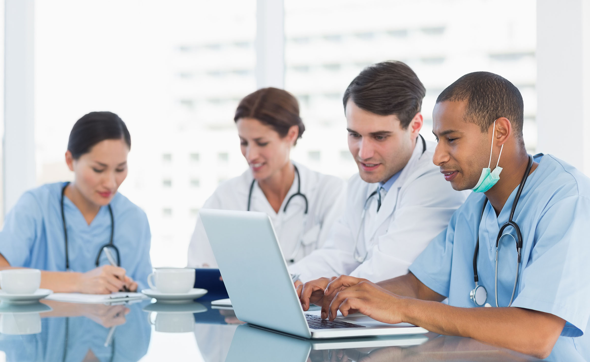 Doctors on laptop